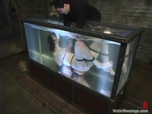 Wolf Lotus and Faith Leon in Waterbondage Video