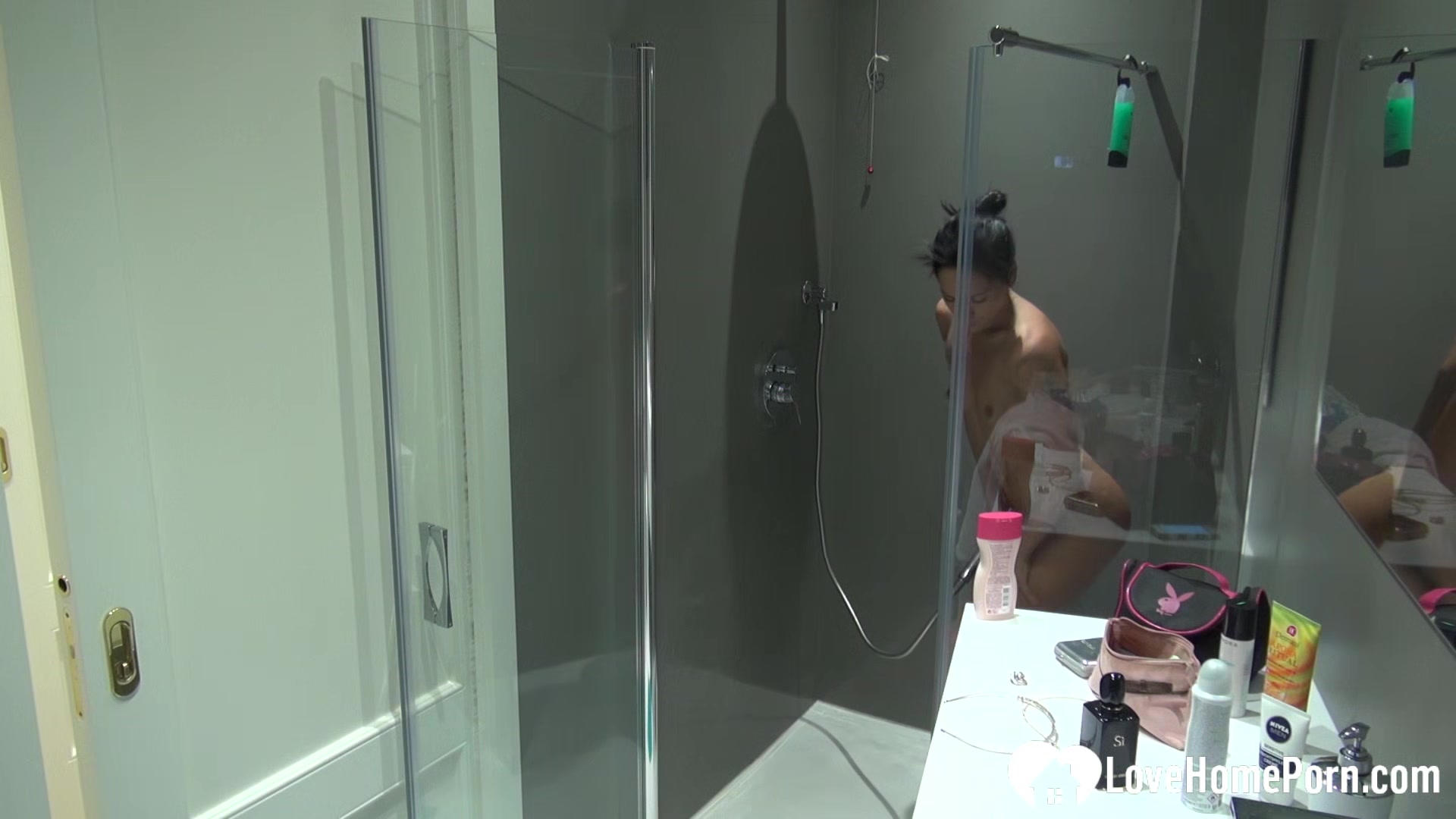 Very sexy stepmom gets recorded while showering