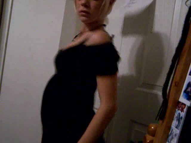 Short-haired blonde girl dances in the homemade video