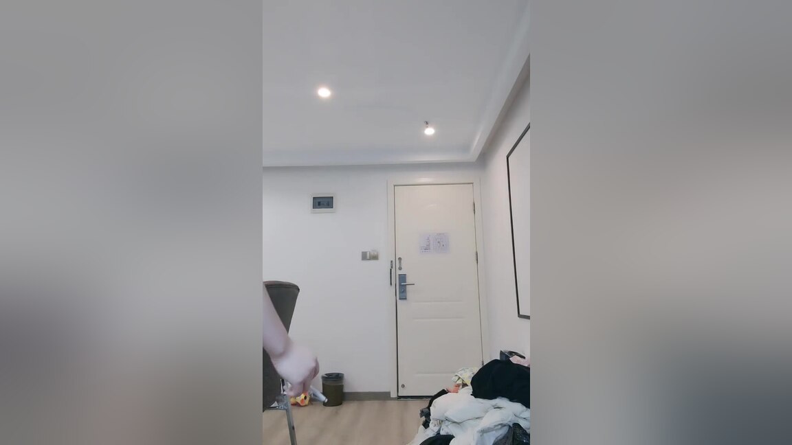 A lovely female participates in sexual activity in a hotel.