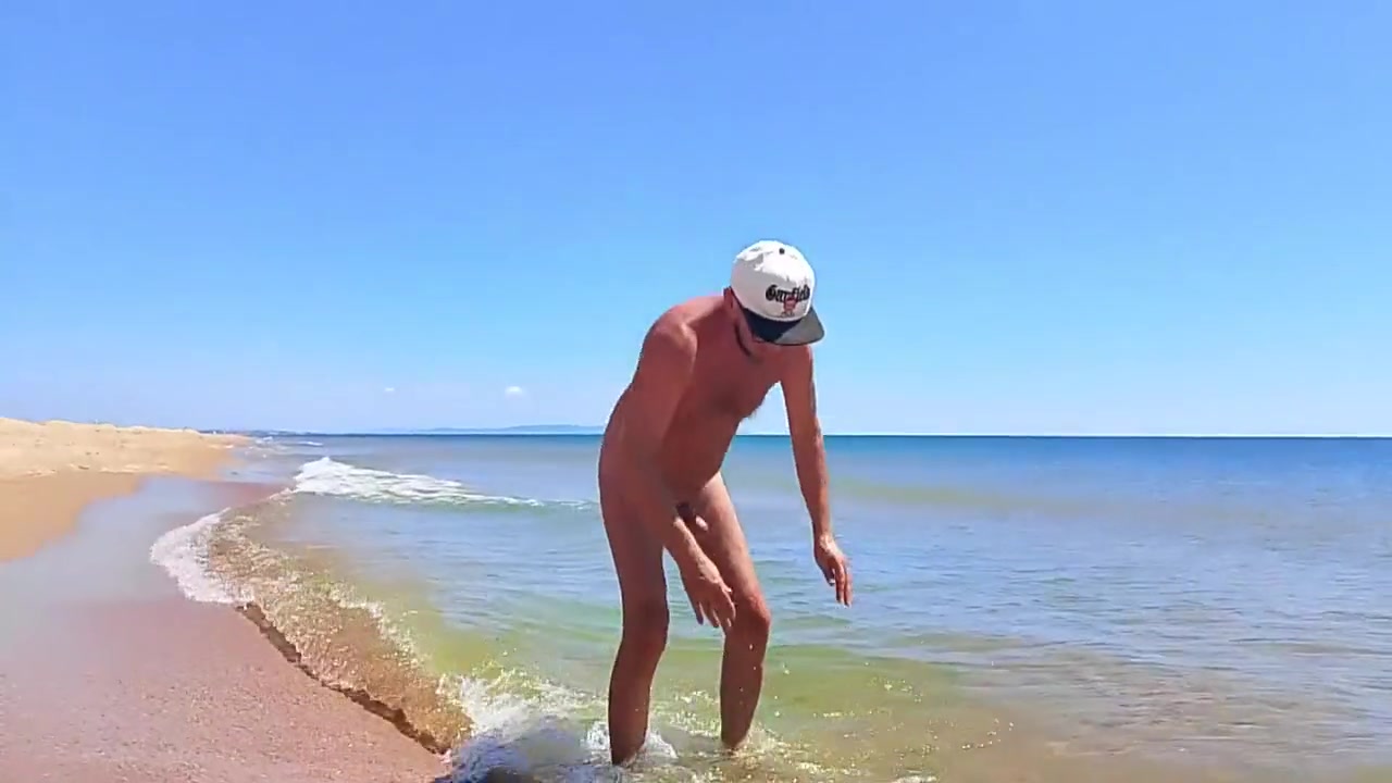 Nudist Couple Having Pegging Session On The Beach