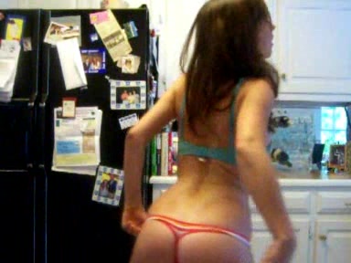 Young busty chick strips in the kitchen, where she belongs