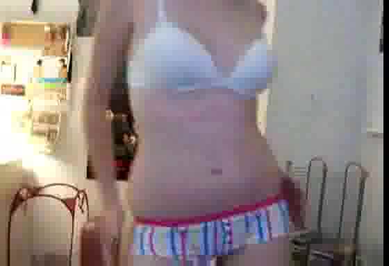 Pussycat poses in front of the webcam in stripped undies