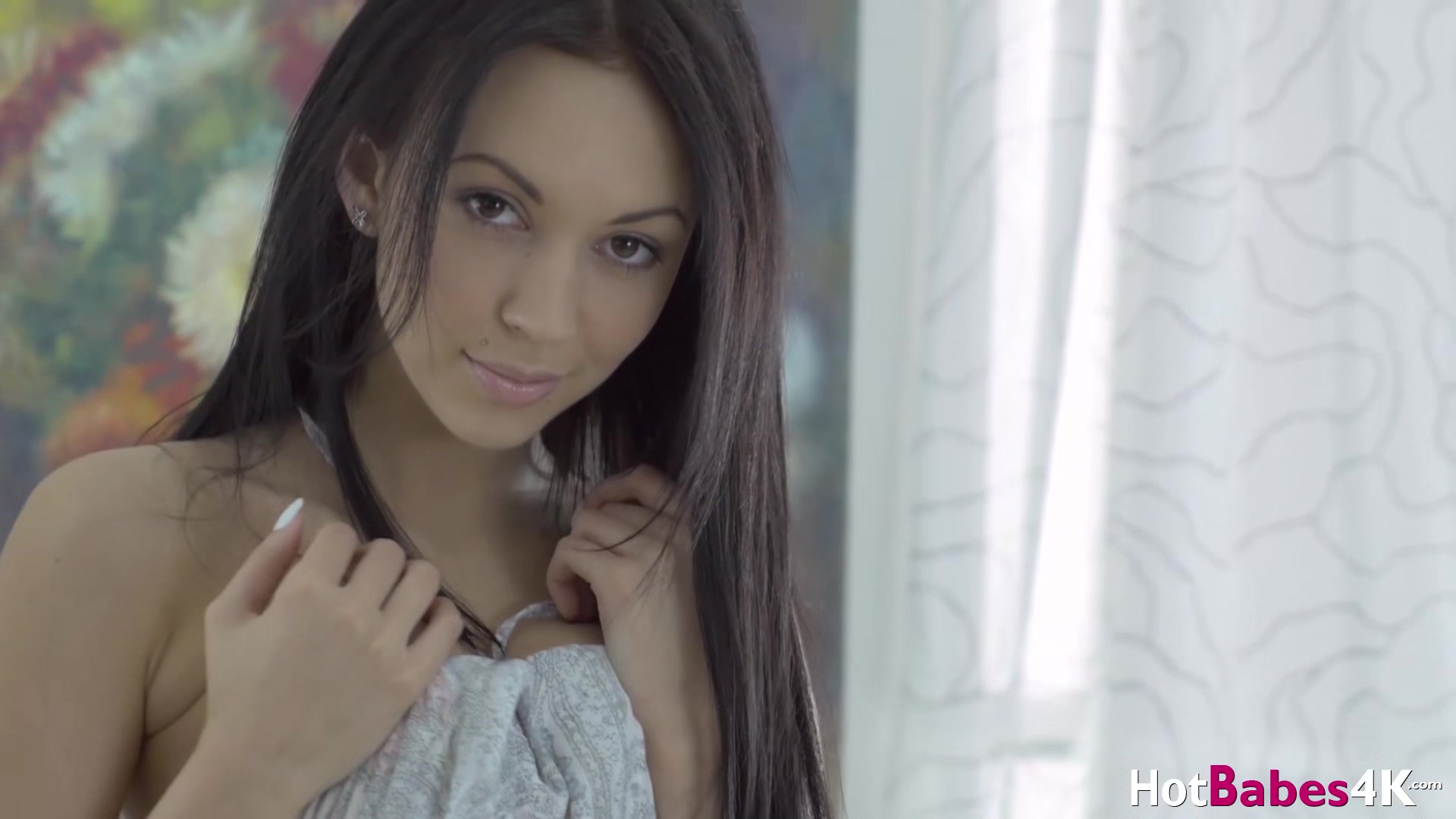 Young babe Nora shows off stunning body while masturbating