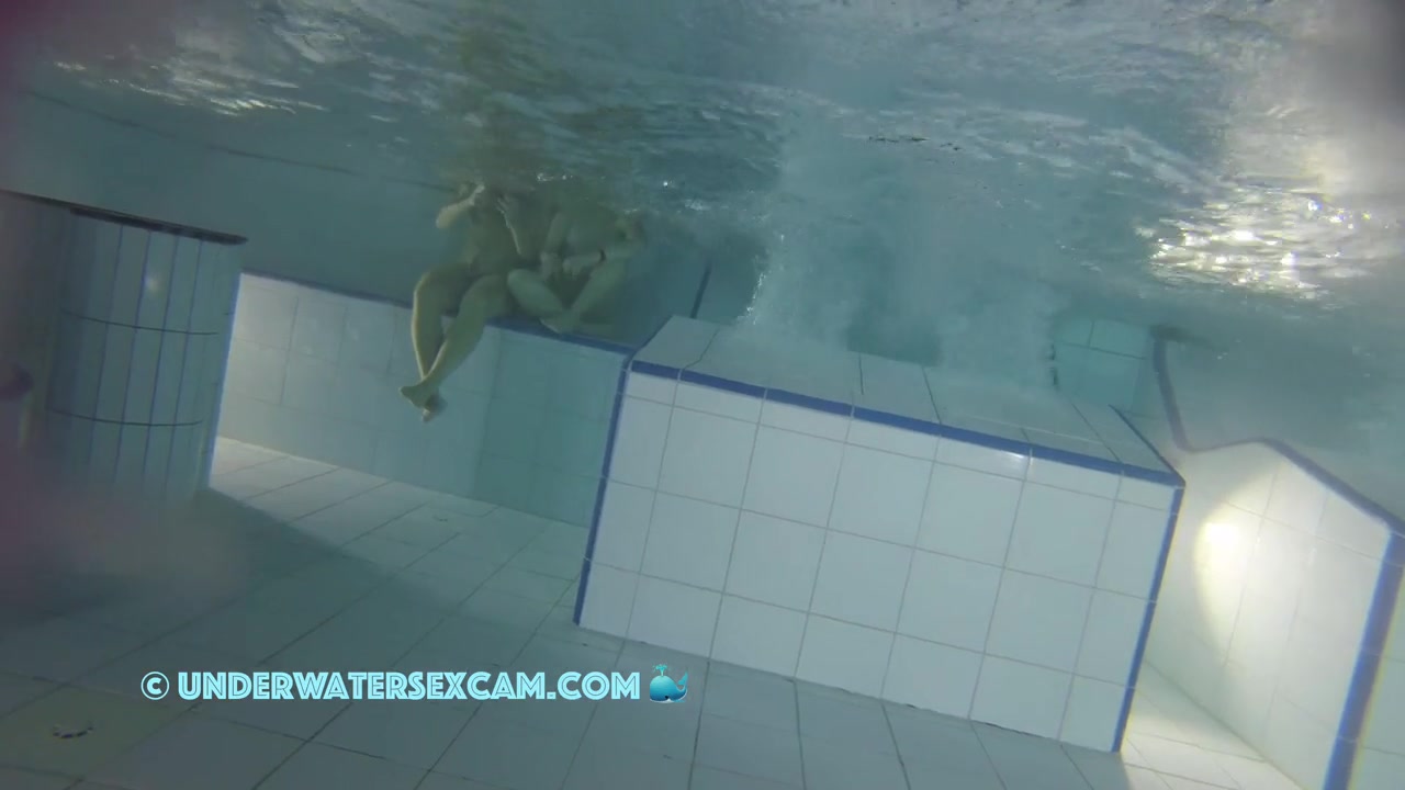 Sporty Couple Regenerating On An Underwater Bench