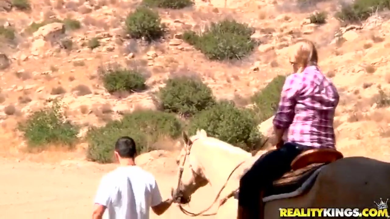 Ridiculously busty Sierra Skye rides the horse