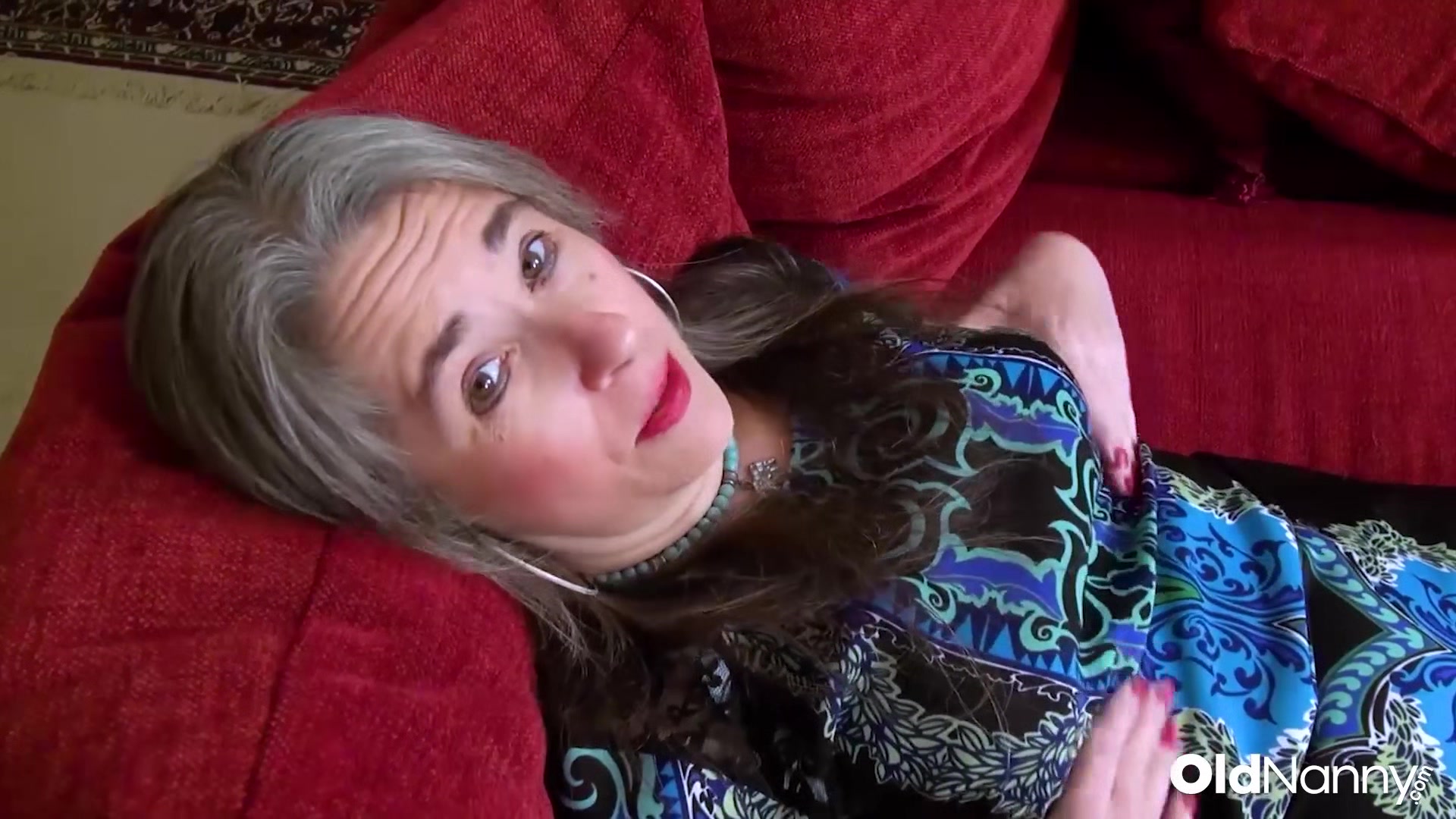 Mature Granny Strips And Toys Her Pussy On Red Sofa