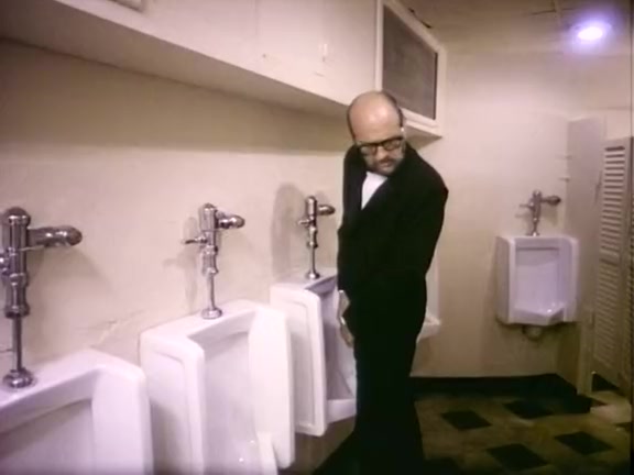 Incredibly hawt classic porn scene in a shitter stall