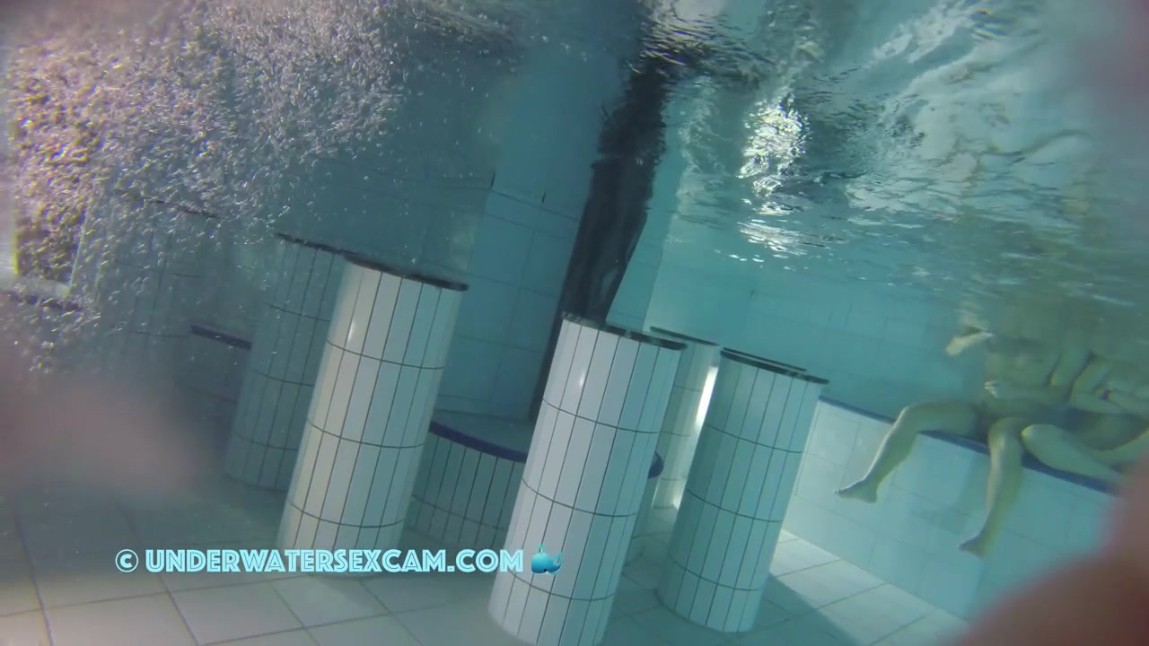Sporty Couple Regenerating On An Underwater Bench