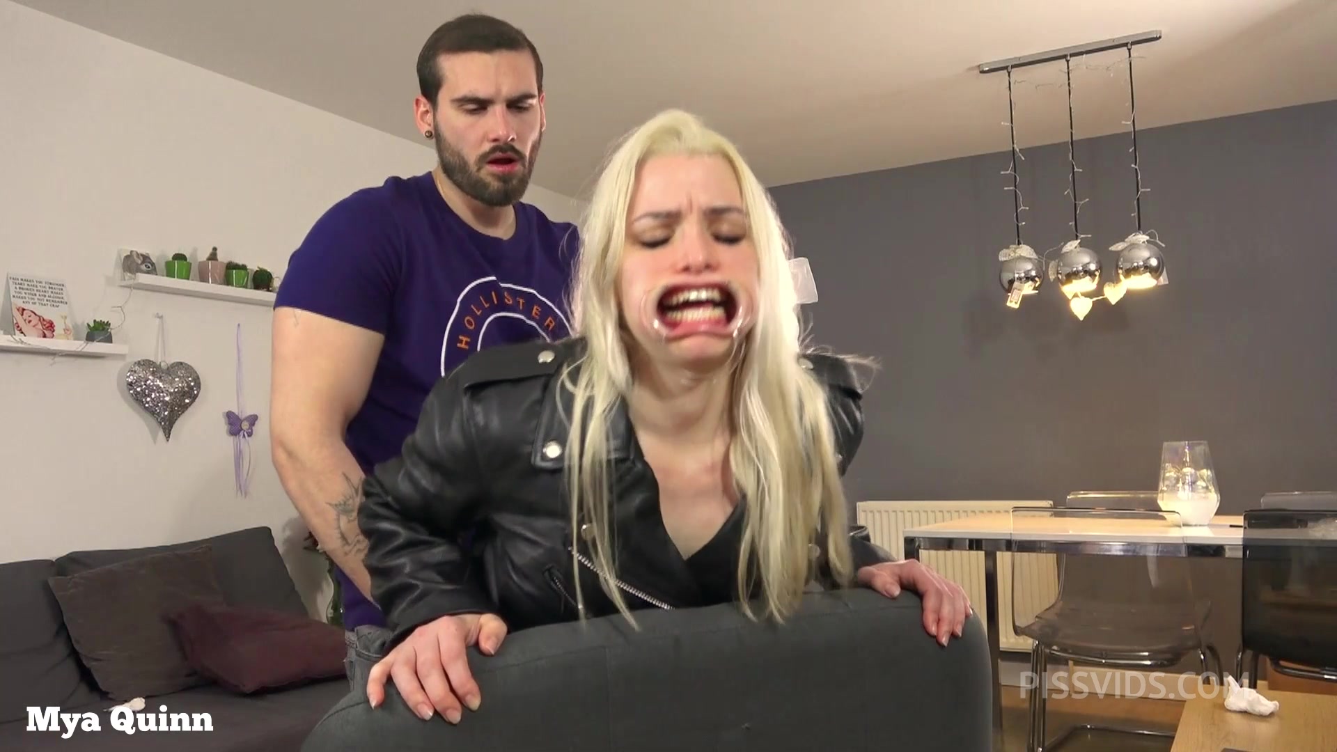 Mya wearing Levi's jeans and leather jacket and gets fucked through hole, piss on clothes, mouth gag deepthroat - PissVids