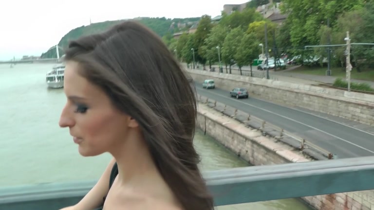 Young babe shows her tits in a public streets