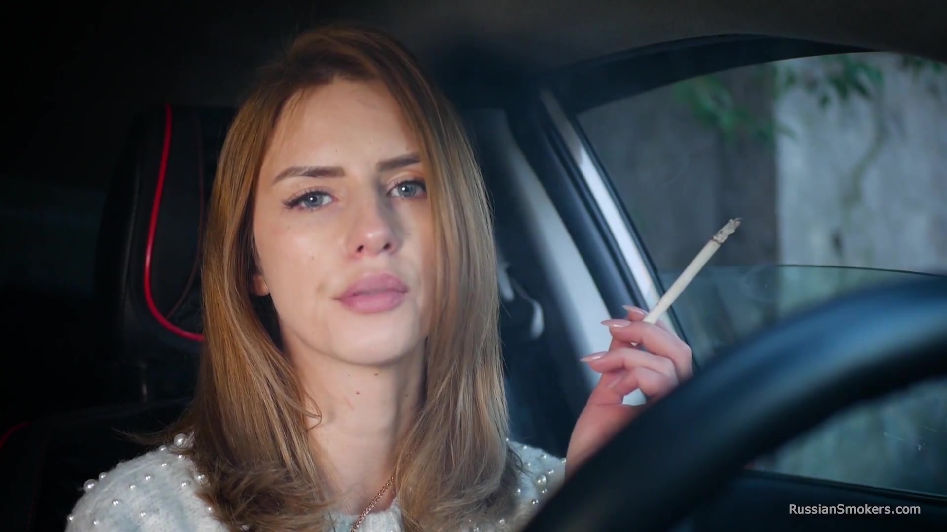 Meet Anastasia In Her Car While She Is Smoking Two 120mm All White Cigarettes
