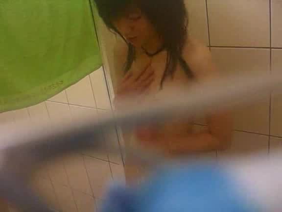 Young Asian babe caught naked in the bathroom by horny