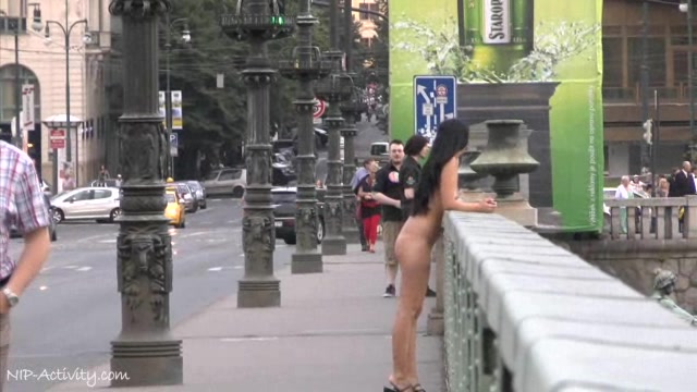 Kinky chick Tara walks naked in public