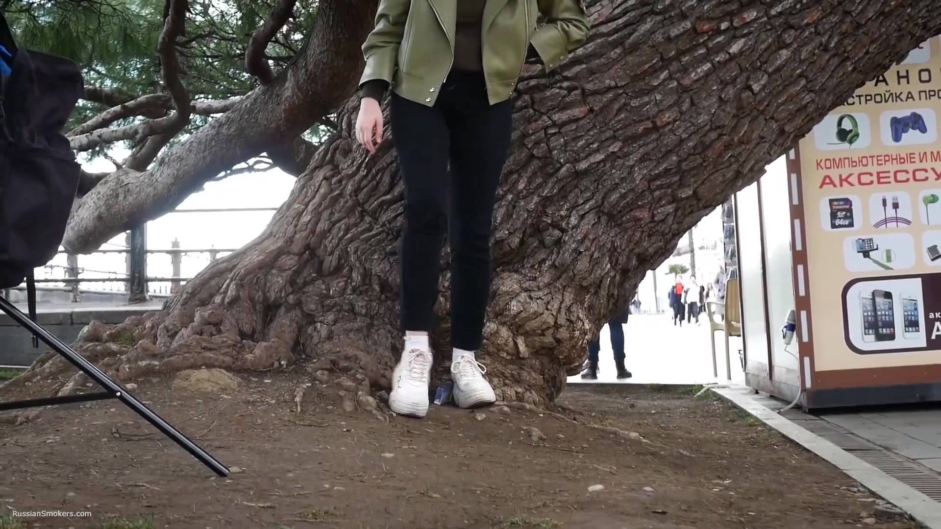 Young Brunette Is Taking An Unhurried Stroll With Allwhite 120mm Cigarette