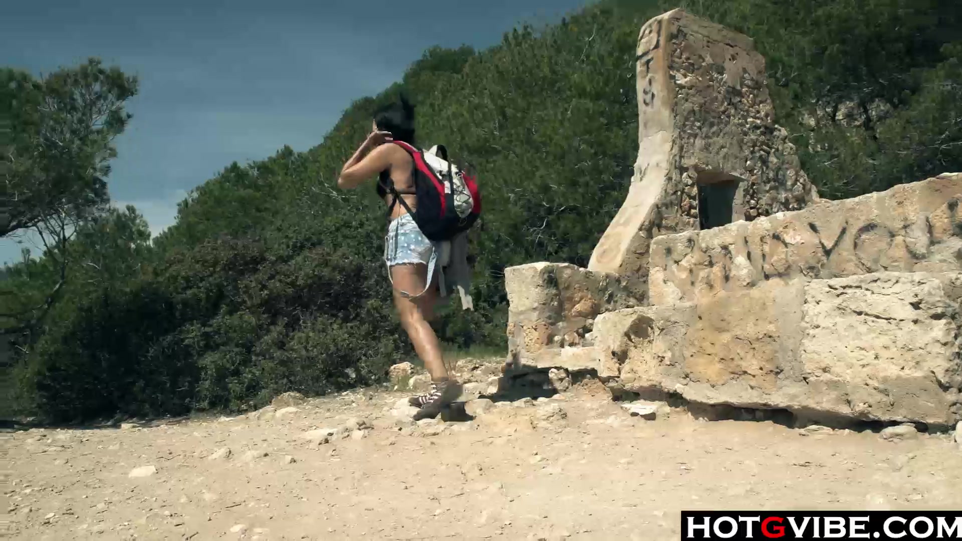 Slim Spanish Latina fucks herself on the beach