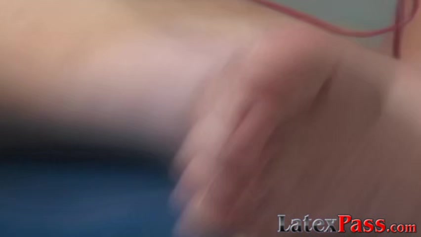 Latex mistress puts lesbian sub onto the dildo machine