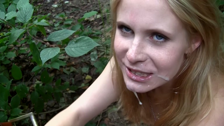 Blonde sexy girl naked in park