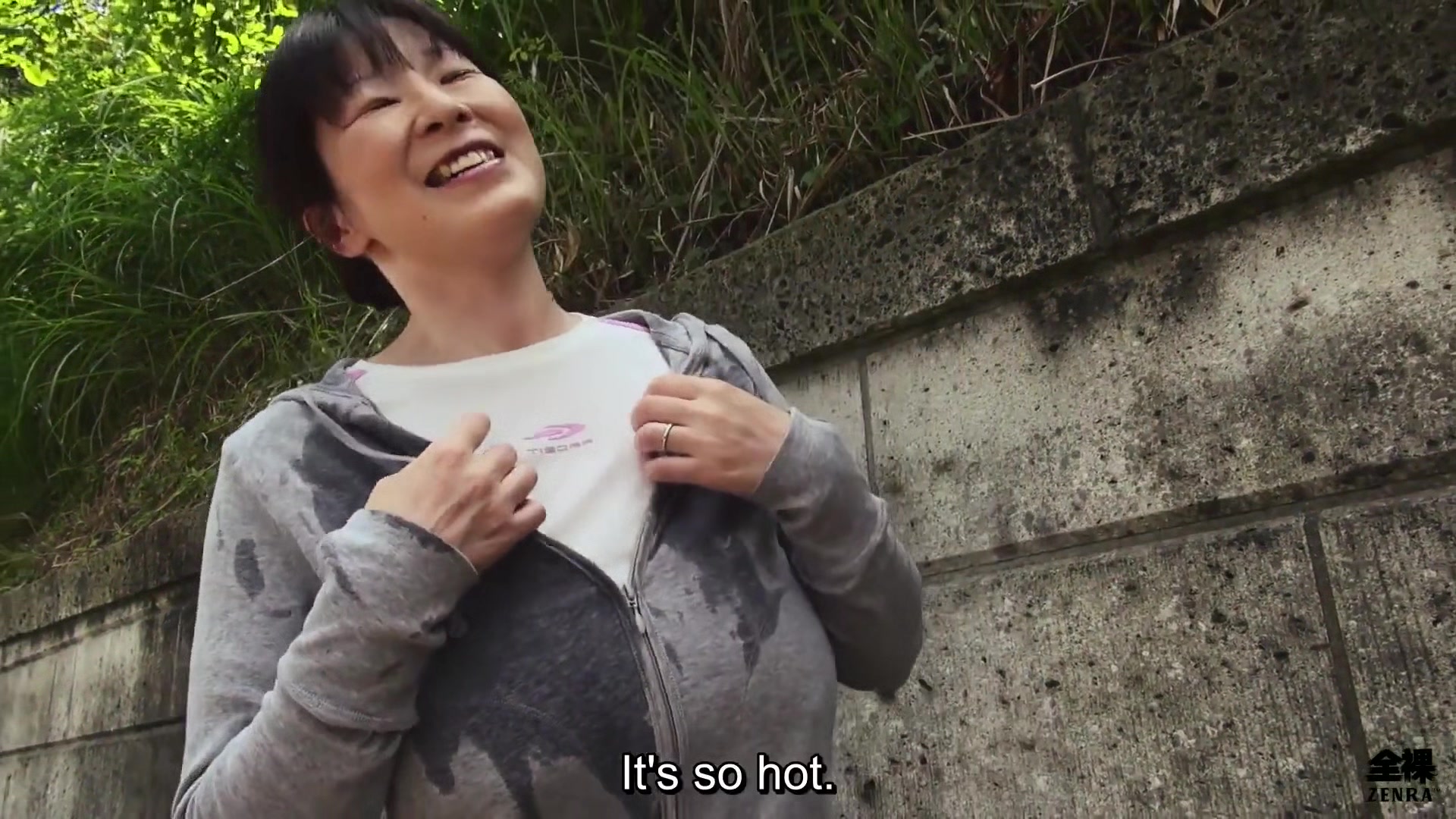 Sweaty older Japanese woman with massive tits uses them on my feet