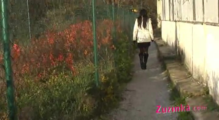 Zuzinka in a field teased by horny camera guy