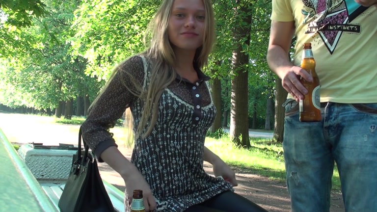 Sexy fellatio in the park bench