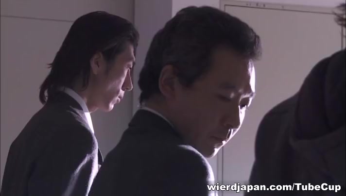 Hot Asian milf in an office suit in horny group fucking