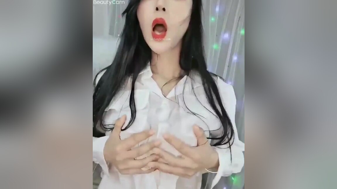 Beautiful Asian Babe Playing On Camera
