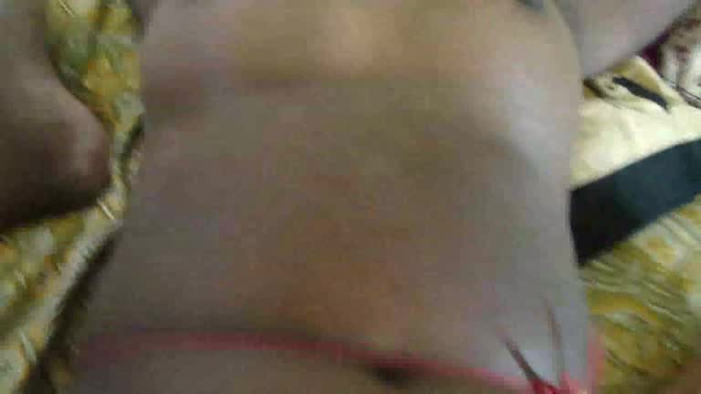 Black skinned girl has something inside her pussy