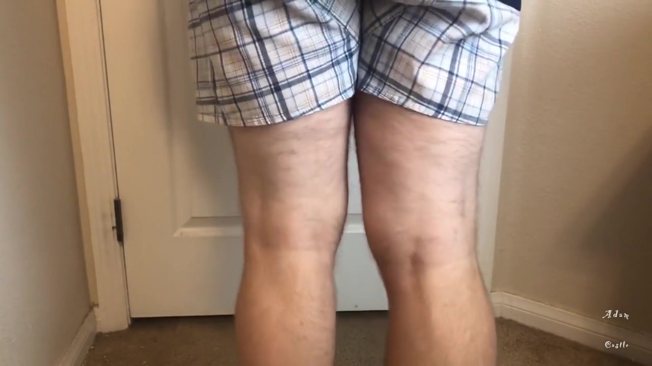 Man Does Calf Flexing With X-mas Socks