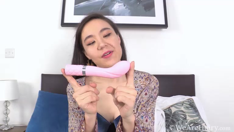 Rylee Mae masturbates with her pink toy in bed - WeAreHairy