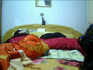 A man being please by his wife and their old maid