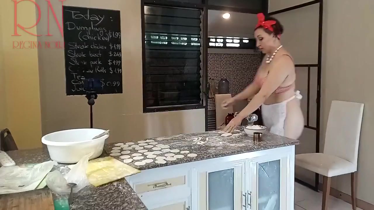 Regina Noir In Nudist Housekeeper Cooking At The Kitchen. Naked Maid Makes Dumplings. Naked Cooks. Bra 2
