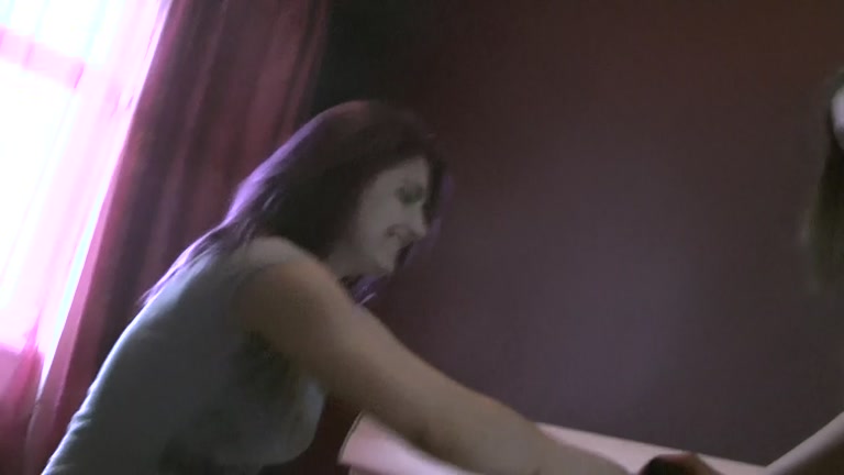 Chicks do some lesbian action with strap-on