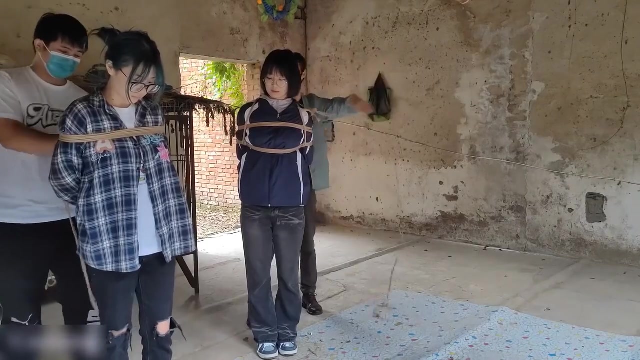 Two Girls Suspended In An Abandoned House