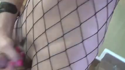Tgirl with piercings plays with her cock