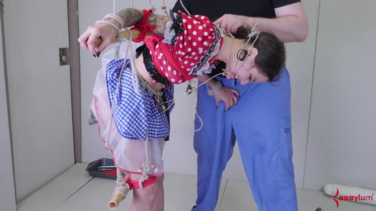 Tied up sub deepthroats dick