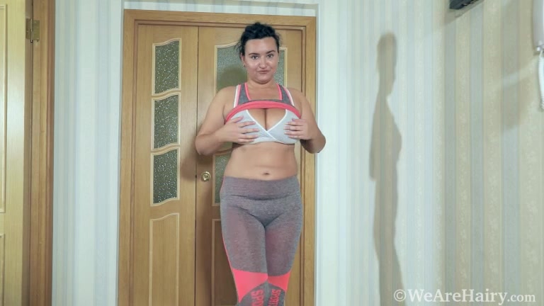 Ramira strips naked after a workout in her hallway
