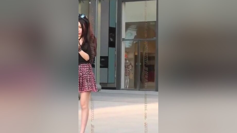 Chinese girl in short skirt