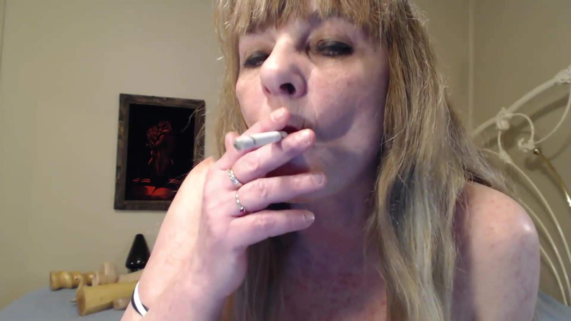 Dangling Smoke From Mt Red Lips - TacAmateurs