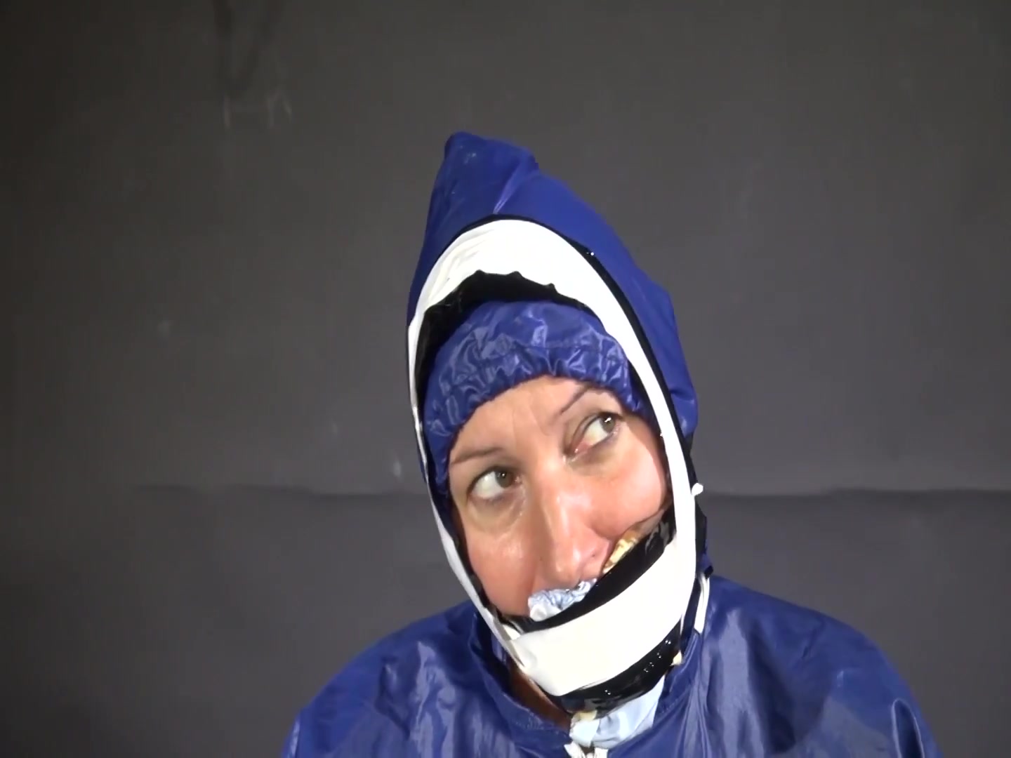 Watch Sandra Beeing Bound, Pantygagged And Finally Pantyhooded In Her Shiny Nylon Rainwear