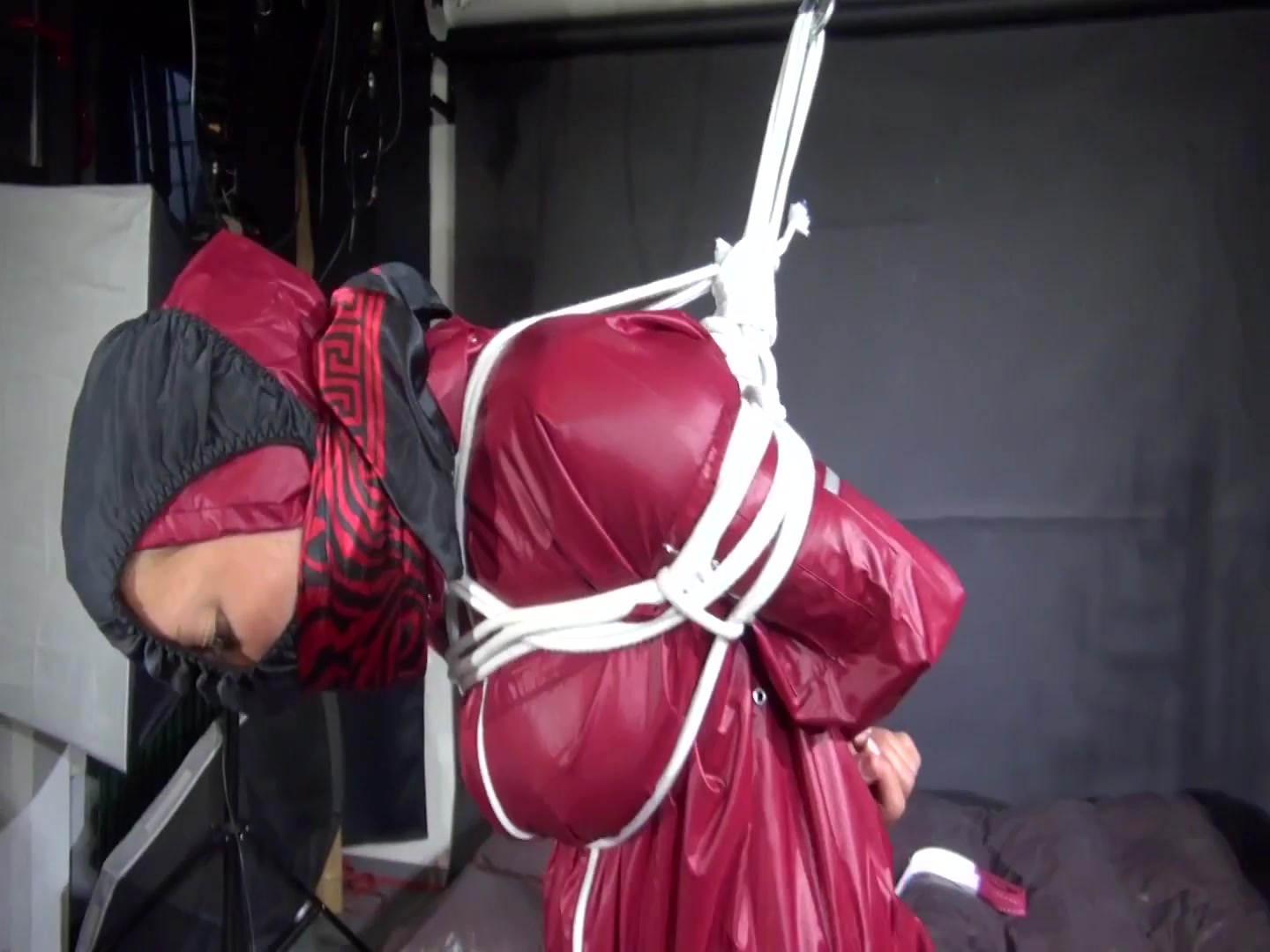 Watch Sandra Beeing Bound Gagged And Pantyhooded In Her Shiny Nylon Rainwear