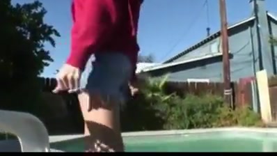Shemale solo outdoor at the poolside