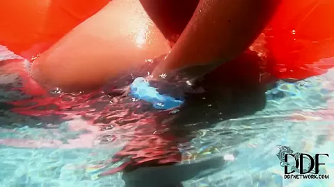 teen 18+ blonde Evelyn masturbates in the pool