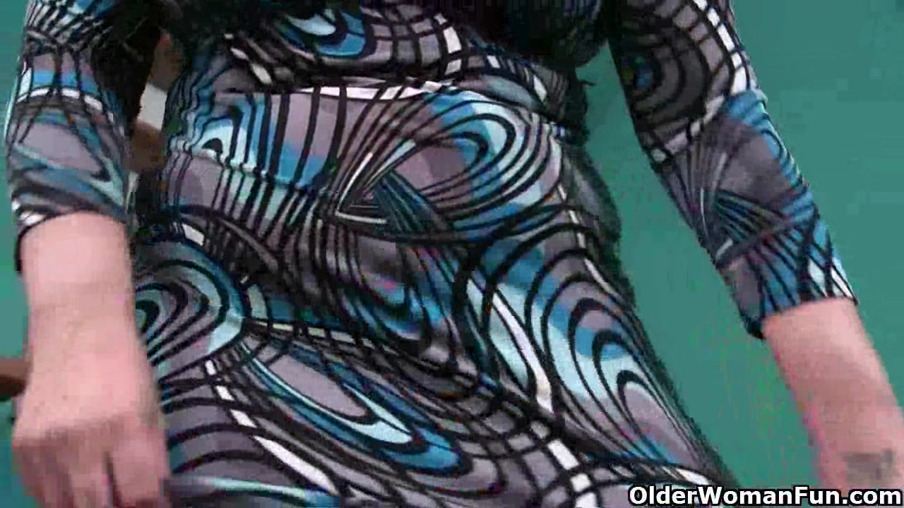 Granny with big tits masturbates