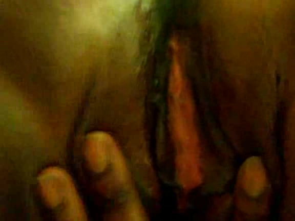 Pinkish interior of this big black cunt in the homemade clip