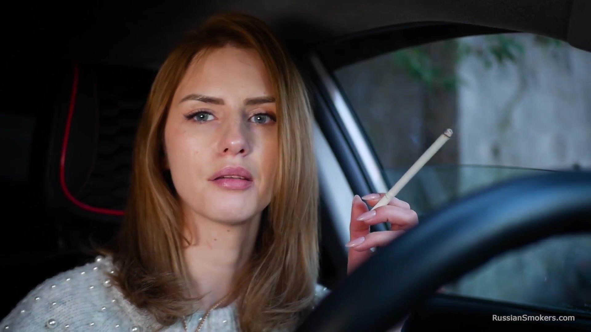 Meet Anastasia In Her Car While She Is Smoking Two 120mm All White Cigarettes
