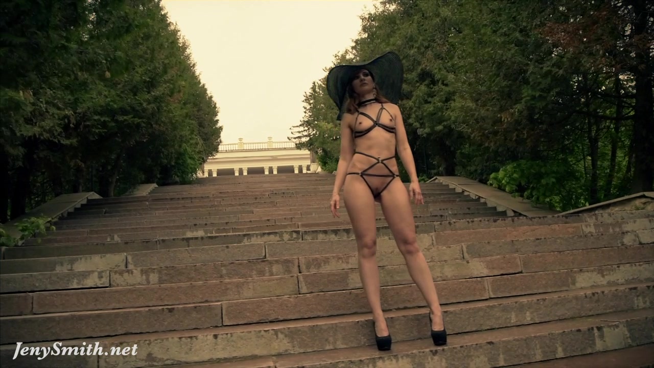 Jeny Smith wearing MyMokondo strap bondage in old park