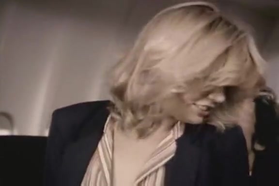 Stacey Donovan, Paul Thomas in retro porn clip featuring sex with a stewardess