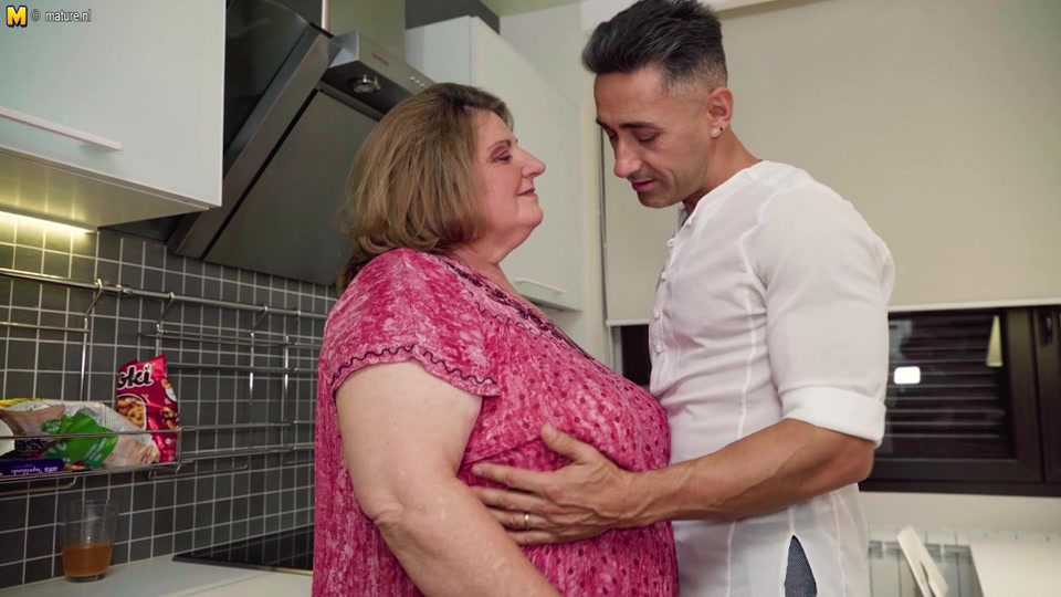 Huge breasted mature BBW fucking a muscled younger man