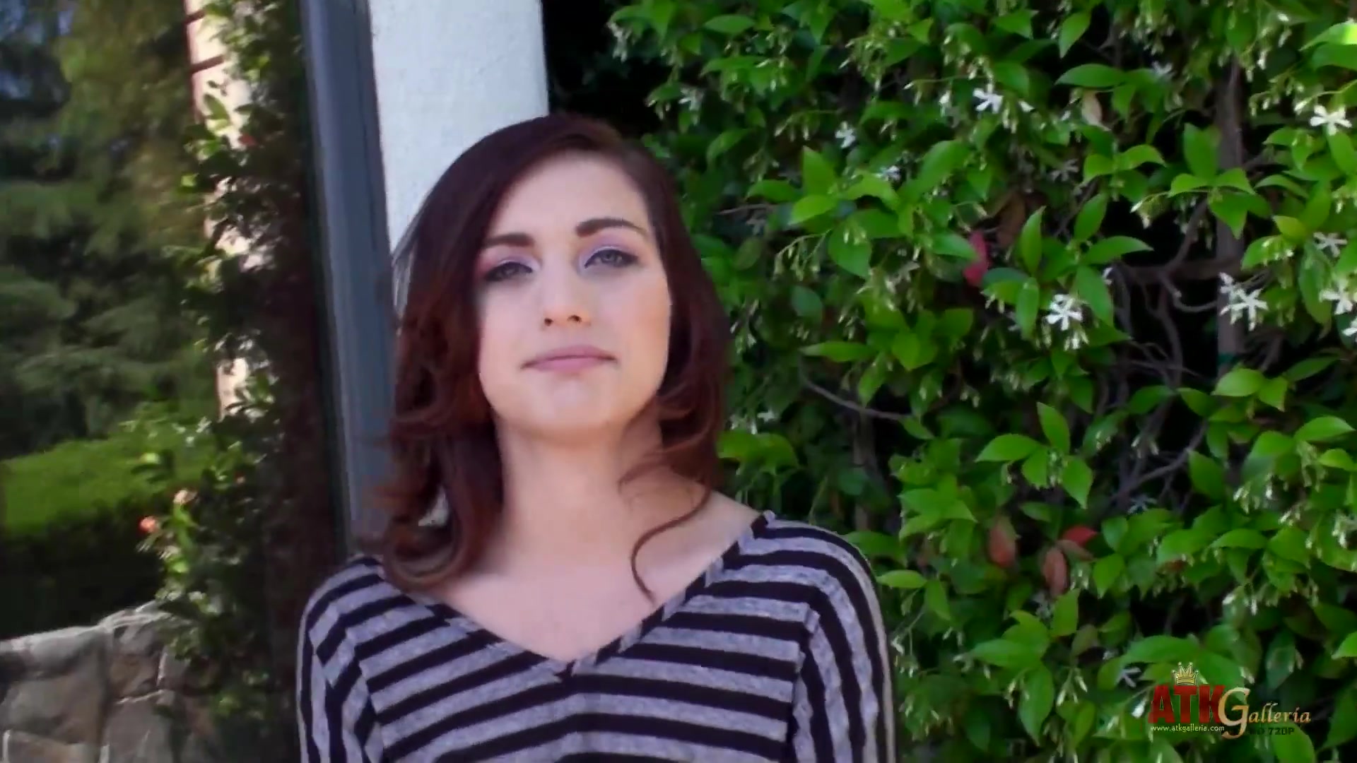 Sweet Maryjane Johnson smoking a cigarette and showing her small tits
